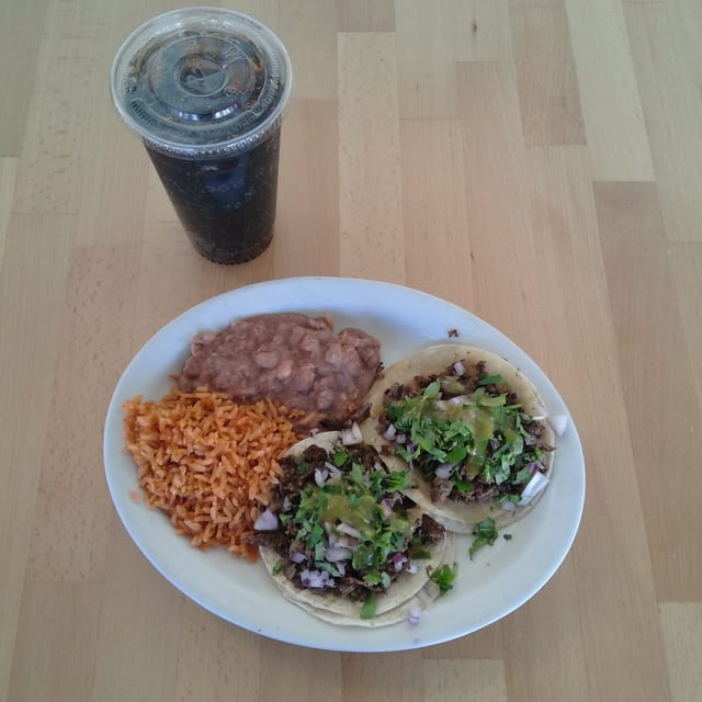 Taco Plate Special 2 Tacos, Rice, Beans & Drink.